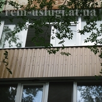 Фото. Наружная обшивка балкона под дерево. Кривой Рог