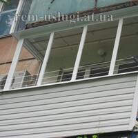 Фото. Ремонт балкона. Белый сайдинг. Кривой Рог