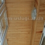 Фото. Отделка балкона деревянной вагонкой